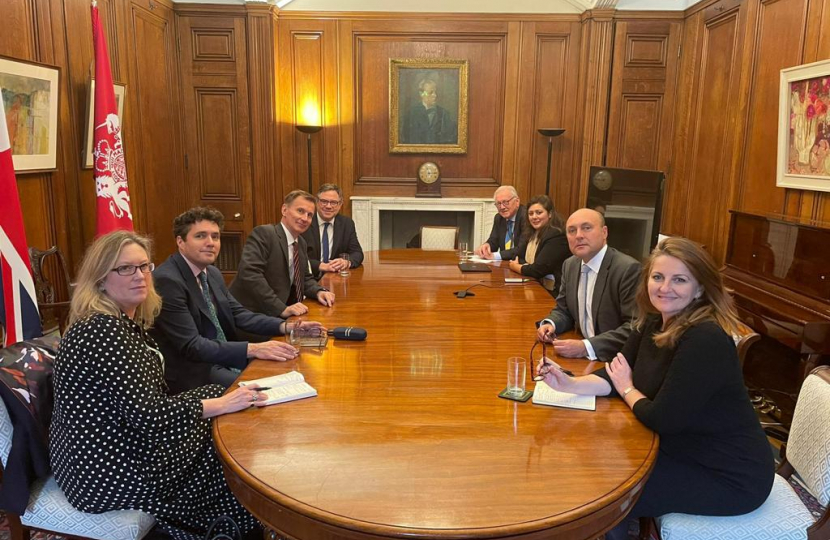 Our MP Caroline Ansell pictured with the Chancellors and Ministers seated together, holding a discussion. 