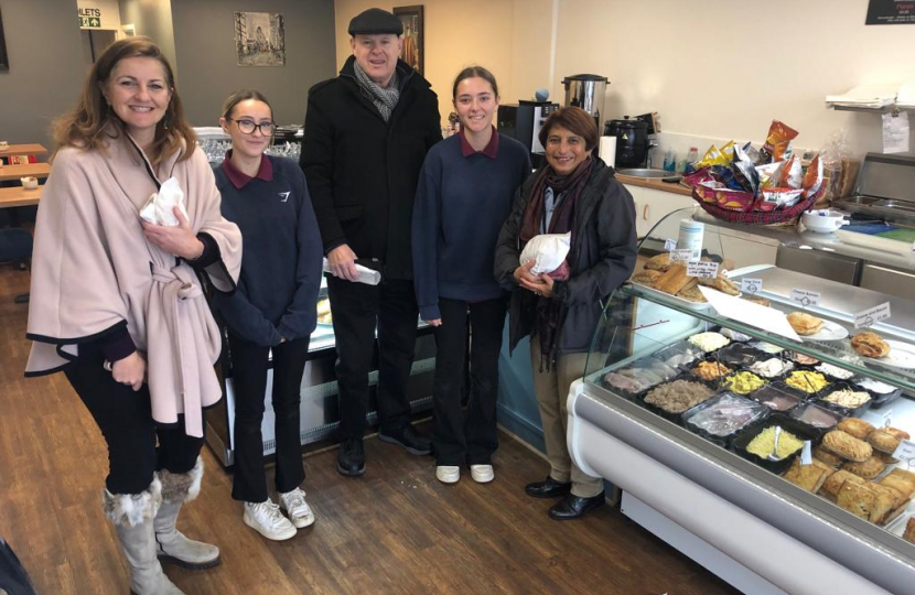 Caroline Ansell MP with Cllrs. Kshama Shore and Nigel Goodyear buying goodies inside the Poppy Seed bakery on Beatty Road. Featured with some of Poppy Seed's Saturday staff.